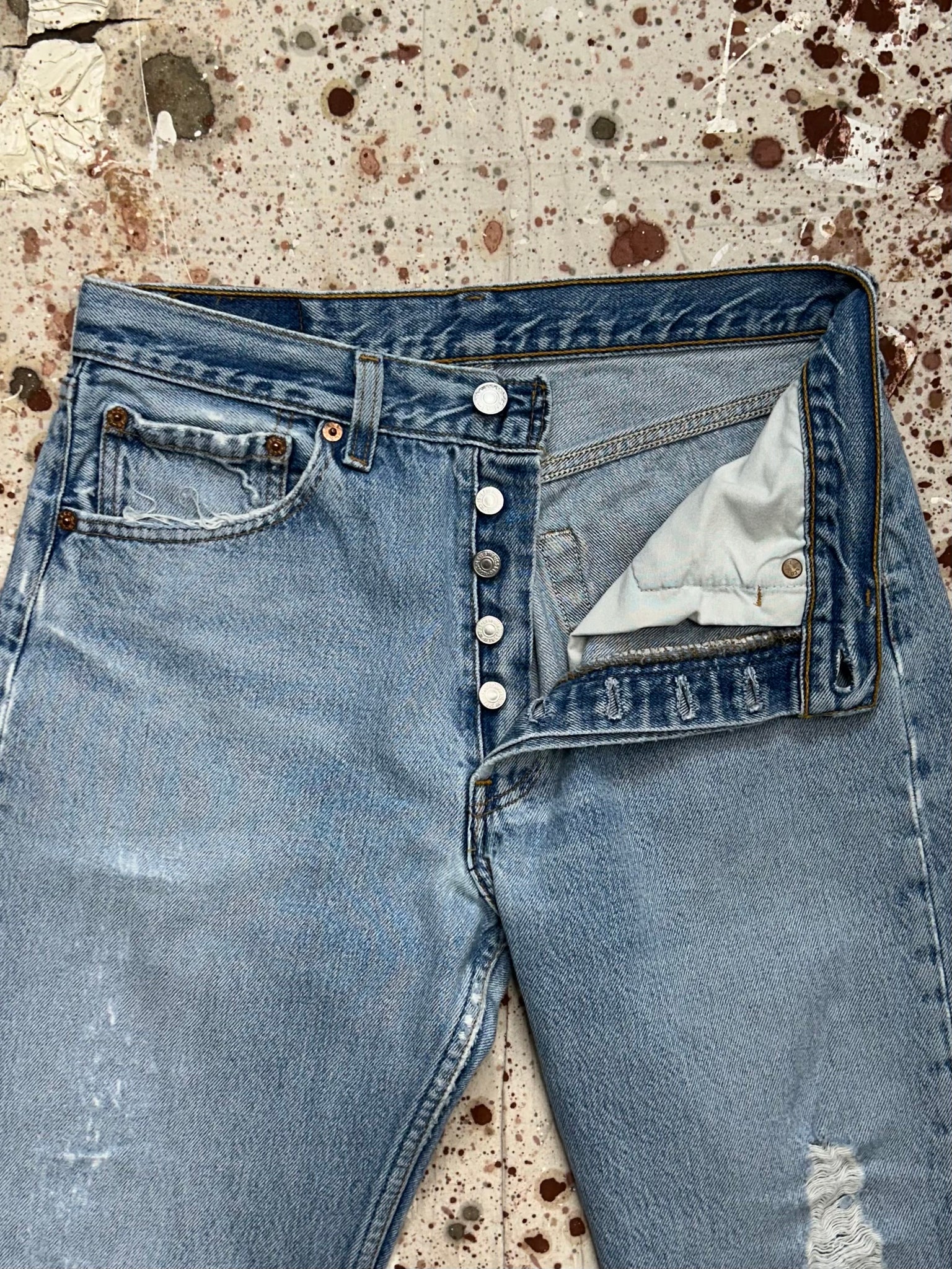 Vintage USA Levi's 501xx Light Wash Denim Jeans with Feathers