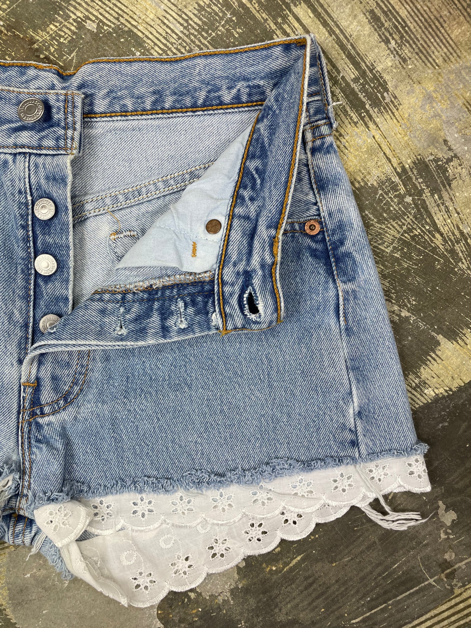 Denim shorts with lace trim sales